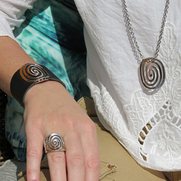 Black leather jewelry with silver detail in powerful design - "circle of life"